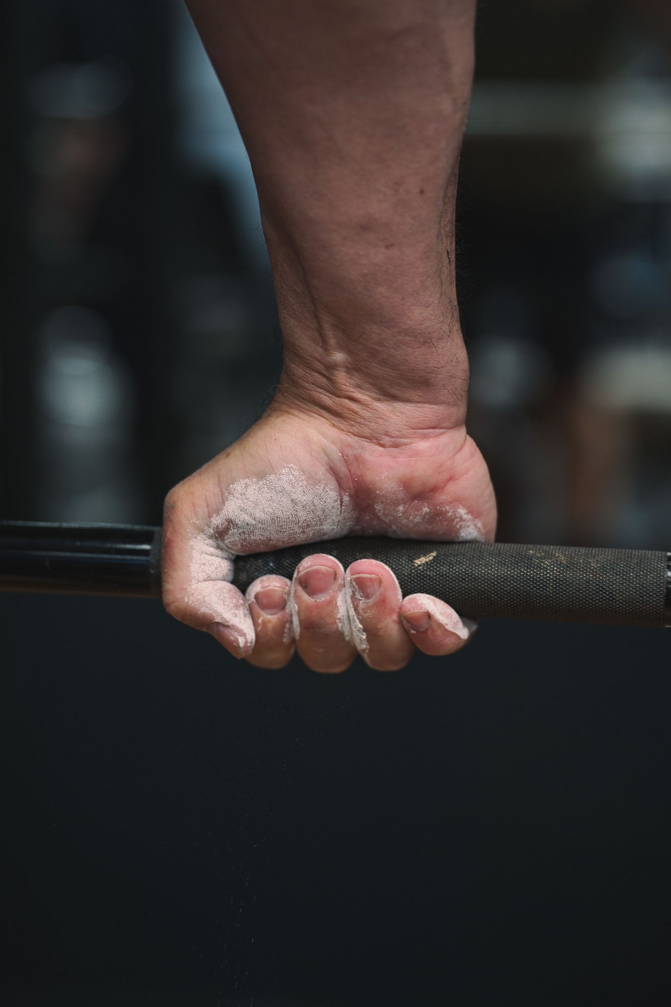 Chalked hand on the bar